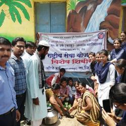 NSS Volunteer doing work during NSS Special Camp-2019 at village limba Tq.dist.beed.by village people & Head master of Z.p. school.